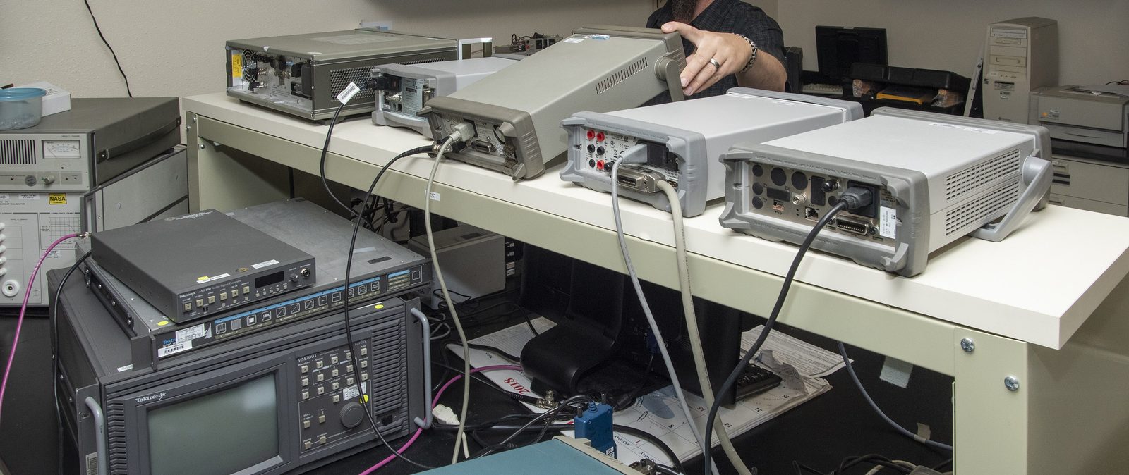 Calibration laboratory bench with test and measurement instruments